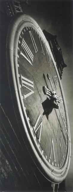 Spasskaya Tower of the Kremlin, clock being repaired by 
																	Dmitri Baltermants