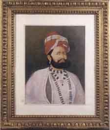 Portrait d'un prince Rajpoute au turban rouge by 
																	 Indian School