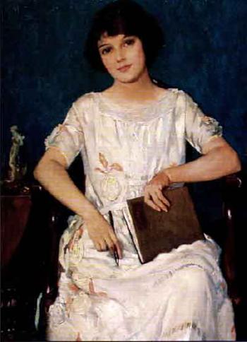 Seated girl with diary by 
																	Charles H Taffs