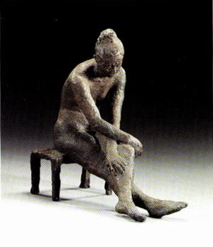 Seated figure of a girl by 
																	Uli Nimptsh