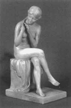 Seated female nude with a drape by 
																	Sandor Jaray