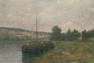 River landscape with barge in the foreground and a townscape beyond by 
																	Louis Lucien d'Eaubonne