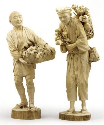 Flower seller with basket of flowers on his back by 
																	Nagasawa Jukan