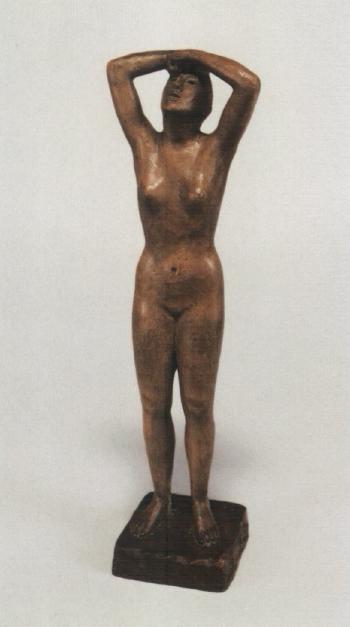 Standing female figure with arms raised by 
																	Kurt Edzard