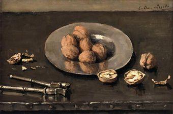A still life with walnuts on a pewter plate by 
																	Lucie van Dam van Isselt