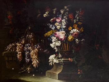 A still life of grapes upon ruined stonework, with jasmine, peonies and other flowers in an urn by 
																	Giuseppe Vincenzina