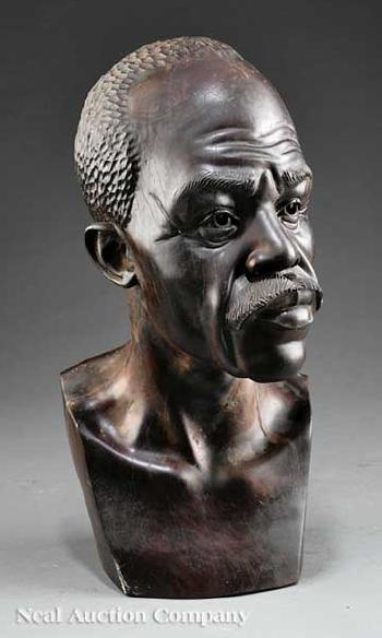 Bust of a man by 
																			Barnabas Ndudzo