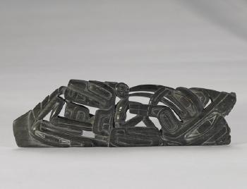 Sculpture of stylized Northwest Coast motifs by 
																	 Haida School