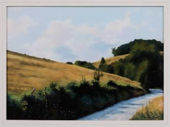 Road at the base of a hill by 
																	Coralie Tweed