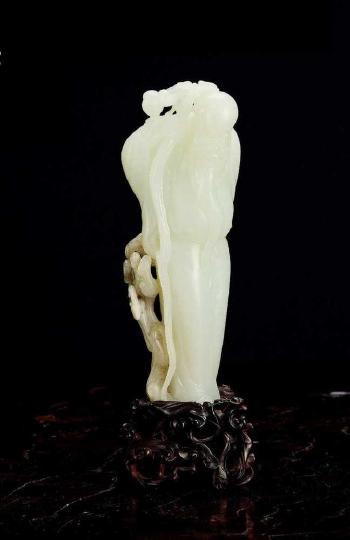 Ornament with peasant figure design by 
																	 Wu Desheng