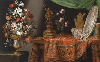 Still life with a bouquet of flowers and gold ware on a rug by 
																	Adeodato Zuccati