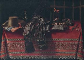 A still life with items of clothing, weapons and a mirror on an embroidered, red table cloth by 
																	Carlo Manieri