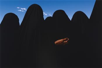 Iraq (Women in Black Veils) by 
																	James Nachtwey