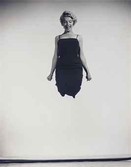 Marilyn Jumping by 
																	Philippe Halsman