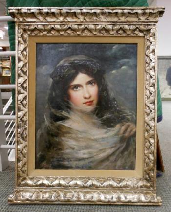 Portrait of a dark-haired beauty in a white veil by 
																			Adolf Muller-Ury