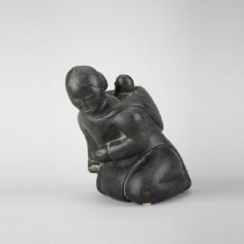 Kneeling woman with child by 
																			Nancy Pukingrnak Aupaluktuq