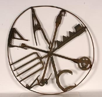 Farm tool wheel by 
																	Rodney Rosebrook