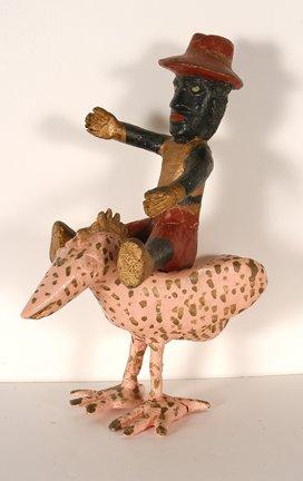Black man riding a chicken by 
																			John Vivolo