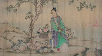 Jeune femme assise sur un rocher sous un arbre en fleurs by 
																	 Zi Xiangtu