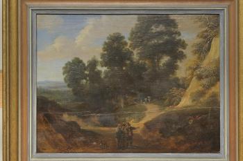 Wooded landscape with figures on a path by 
																			Lucas Achtschellinck