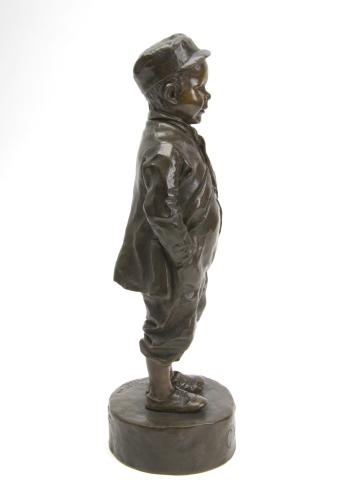Young boy standing with his hands in his pockets by 
																			Felix Pardo Tavera