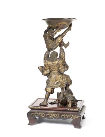 A fine and large gilt bronze figural group of Benkei and two assailants by 
																			Miyao Eisuke