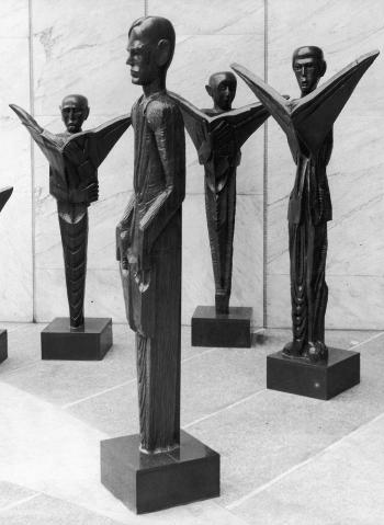 Seven wooden sculptures commissioned by the Daily Mirror in 1960 by 
																			Ben Enwonwu