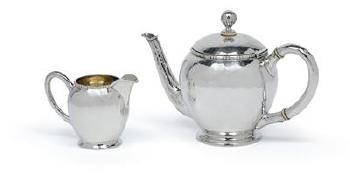A small teapot and cream jug by 
																	 Jakob Grimminger