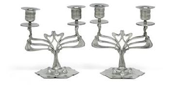 A pair of 2 branched candlesticks by 
																	 Osiris - Walter Scherf & Co