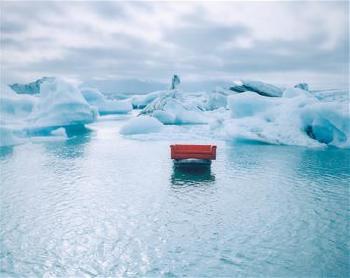 Jökulsárlón, glacial lagoon of the Vatnajökull Glacier, from the series The Red Couch – A Portrait of Europe, Iceland by 
																	Horst Wackerbarth