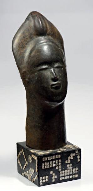 Masque de femme africaine by 
																	Maurice Daurat