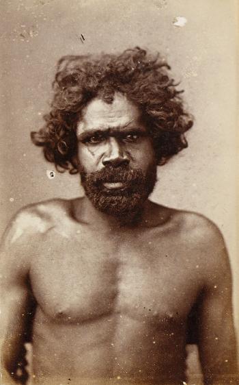 Australian chief. Australian man. Warrior. Man and woman in bush by 
																			John William Lindt