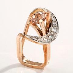 A morganite and diamond ring set with a circular-cut morganite by 
																			Jytte Klove