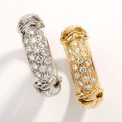 Two diamond rings set by 
																			 Van Der Bauwede
