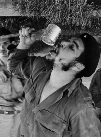 Che Guevara during a break in voluntary work in the Martí Neighbourhood, Havana by 
																			Liborio Noval