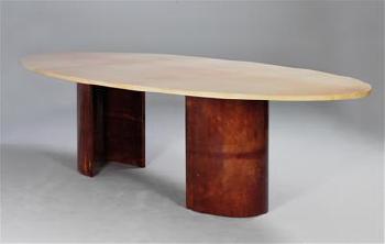 A large dinner table by 
																	Aldo Tura