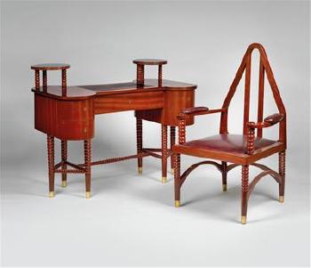 A desk and armchair by 
																	Fanny Harlfinger