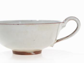 Teacup And Saucer by 
																			Otto Lindig