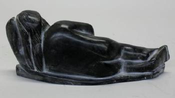 Nude reclining woman by 
																			Davidiluak Alasua Amittu
