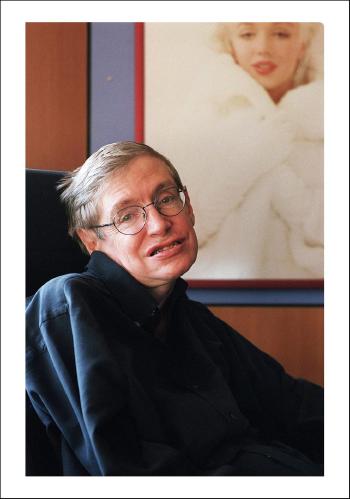 British physicist stephen hawking, next to a photo of his idol, US star Marilyn Monroe, in his office at the University of Cambridge where he teaches by 
																	Ammar Abd Rabbo