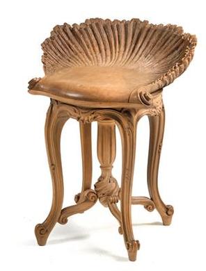 A piano stool by 
																	 Hampton and Sons