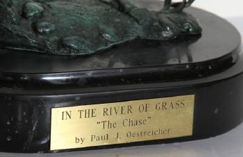 In the river of grass - The chase by 
																			Paul Oestreicher