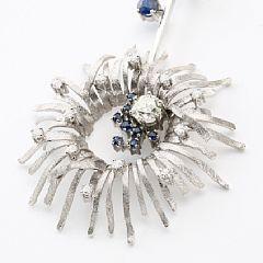 A sapphire and diamond necklace set by 
																			John Rorvig