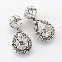 A pair of diamond ear pendants set by 
																			 Gabriel & Co
