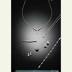 A pair of diamond ear pendants set by 
																			 Gabriel & Co