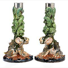 A pair of earthenware candlesticks by 
																			Aage Weimar