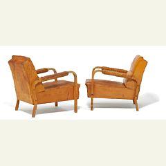 A pair of rare and early easy chairs by 
																			Alvar Aalto