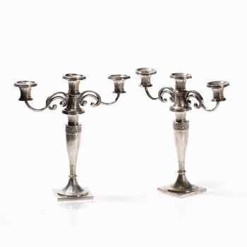 Pair of Silver Candlesticks by 
																			Johann Heinrich Lorenz Kleucker