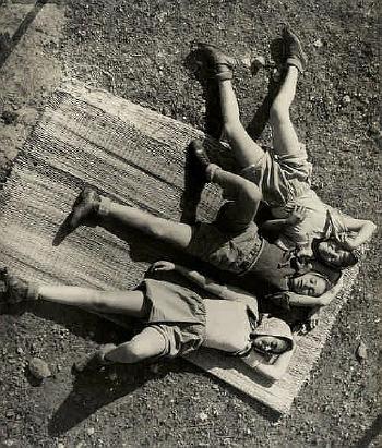Kibbutz workers resting by 
																	Walter Zadek