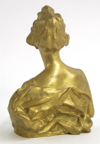 Bust of a beauty by 
																			Leopold Savine